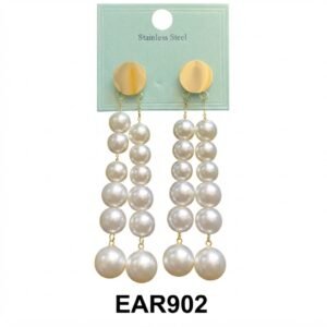 Fancy round earrings with pearl accents in gold.